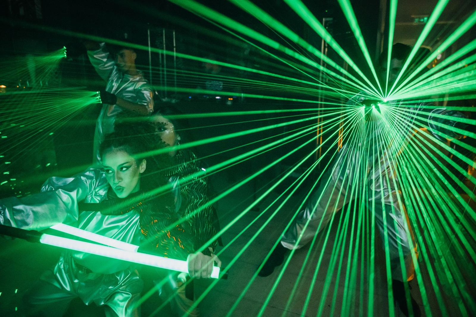 Corporate event artistic activation with laser performance